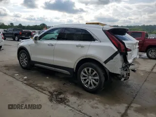 2019 Cadillac XT4 FWD Premium Luxury with VIN 1GYFZCR43KF151044, listed as a Copart auction lot 57912915 with 71,138 mi miles and Salvage title. Bid and sale history available at DreamBid. Image 2.
