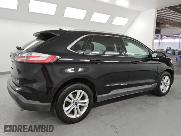 2020 Ford Edge SEL с VIN 2FMPK3J90LBA73990, выставлен на аукционе Copart как лот 61035945 с пробегом 113 511 миль миль и Чистый • Clean title. История ставок и продаж доступна на DreamBid. Изображение 3.