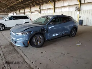 2023 Ford Mustang Mach-E Select z VIN 3FMTK1RMXPMA13134, wystawiony jako Copart lot #55069255 z przebiegiem 22 946 mil mil oraz Szkoda całkowita • Salvage title. Historia ofert i sprzedaży dostępna na DreamBid. Obrazek 1.