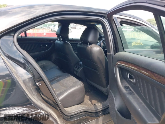 2013 Ford Taurus Limited z VIN 1FAHP2F85DG103747, wystawiony jako IAAI lot #42763099 z przebiegiem 181 891 mil mil oraz . Historia ofert i sprzedaży dostępna na DreamBid. Obrazek 8.