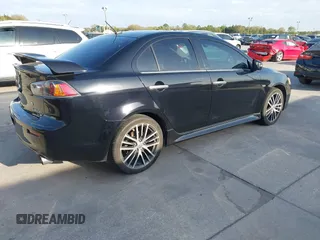 2017 Mitsubishi Lancer ES with VIN JA32V2FWXHU000916, listed as a IAAI auction lot 41727166 with 85,182 mi miles. Bid and sale history available at carsss.com. Image 4.