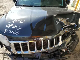 2012 Jeep Grand Cherokee Laredo with VIN 1C4RJEAG2CC215525, listed as a Copart auction lot 51876105 with 148,659 mi miles and Salvage Title. Bid and sale history available at carsss.com. Image 13.