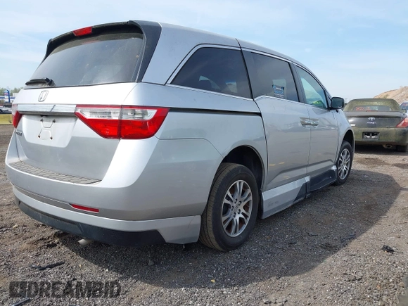 2011 Honda Odyssey EX-L with VIN 5FNRL5H61BB067456, listed as a IAAI auction lot 42131999 with 150,358 mi miles and . Bid and sale history available at carsss.com. Image 4.