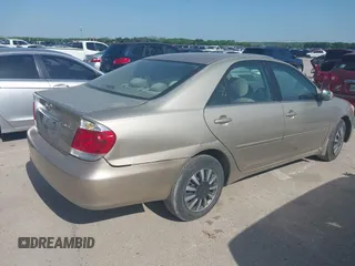 2006 Toyota Camry STD with VIN 4T1BE32KX6U148521, listed as a IAAI auction lot 42014266 with 148,694 mi miles. Bid and sale history available at carsss.com. Image 4.