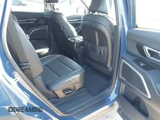 2025 Kia Telluride S with VIN 5XYP64GCXSG587826, listed as a IAAI auction lot 42065749 with 1,864 mi miles and . Bid and sale history available at DreamBid. Image 8.