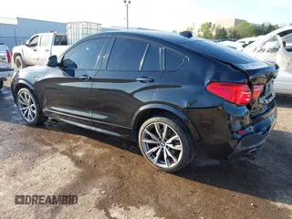 2016 BMW X4 M40i z VIN 5UXXW7C59G0M91223, wystawiony jako IAAI lot #42009394 z przebiegiem 144 771 mil mil oraz . Historia ofert i sprzedaży dostępna na DreamBid. Obrazek 3.