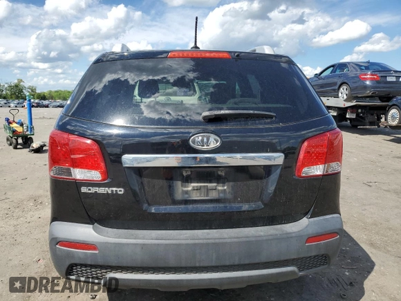 2013 Kia Sorento LX с VIN 5XYKT4A28DG421648, выставлен на аукционе Copart как лот 55887275 с пробегом 173 113 миль миль и Списание • Salvage title. История ставок и продаж доступна на DreamBid. Изображение 6.