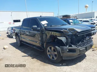 2020 Ford F-150 XL with VIN 1FTEW1E50LKE93170, listed as a IAAI auction lot 41918973 with 99,117 mi miles and . Bid and sale history available at carsss.com. Image 1.