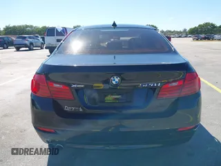 2015 BMW 5 Series 528i xDrive with VIN WBA5A7C58FG144069, listed as a IAAI auction lot 41854112 with 136,403 mi miles and . Bid and sale history available at DreamBid. Image 16.