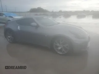 2015 Nissan 370Z Nismo z VIN JN1AZ4EH0FM444256, wystawiony jako Copart lot #54620065 z przebiegiem 78 626 mil mil oraz Szkoda całkowita • Salvage title. Historia ofert i sprzedaży dostępna na DreamBid. Obrazek 4.