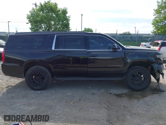 2016 Chevrolet Suburban LT z VIN 1GNSKHKC8GR223442, wystawiony jako IAAI lot #42166983 z przebiegiem 204 827 mil mil oraz . Historia ofert i sprzedaży dostępna na DreamBid. Obrazek 13.