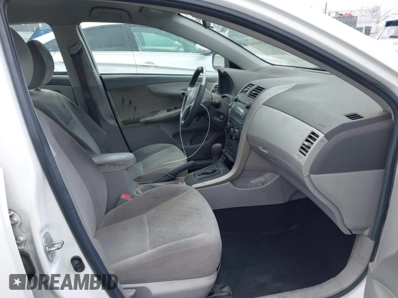 2009 Toyota Corolla with VIN 1NXBU40E99Z082845, listed as a IAAI auction lot 42046564 with 180,910 mi miles. Bid and sale history available at carsss.com. Image 5.