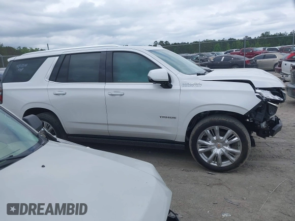 2023 Chevrolet Tahoe High Country z VIN 1GNSCTKL1PR544951, wystawiony jako IAAI lot #42113529 z przebiegiem 33 106 mil mil oraz . Historia ofert i sprzedaży dostępna na DreamBid. Obrazek 13.