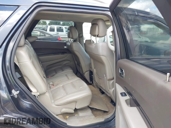 2013 Dodge Durango Crew with VIN 1C4RDHDG7DC657898, listed as a IAAI auction lot 42522353 with 234,483 mi miles and . Bid and sale history available at DreamBid. Image 8.