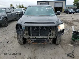 2016 Toyota Tundra SR z VIN 5TFUM5F16GX066153, wystawiony jako Copart lot #73083944 z przebiegiem 68 517 mil mil oraz Szkoda całkowita • Salvage title. Historia ofert i sprzedaży dostępna na DreamBid. Obrazek 5.