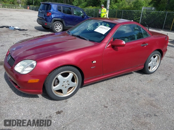 2000 Mercedes-Benz SLK 230 Kompressor with VIN WDBKK47F2YF146797, listed as a IAAI auction lot 42823113 with 35,881 mi miles and . Bid and sale history available at DreamBid. Image 2.