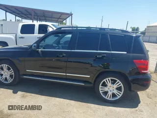 2013 Mercedes-Benz GLK with VIN WDCGG8JBXDG051067, listed as a IAAI auction lot 42107151 with 123,576 mi miles. Bid and sale history available at carsss.com. Image 15.