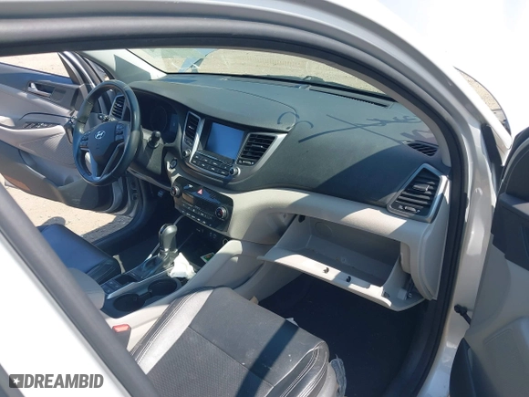 2018 Hyundai Tucson Value with VIN KM8J3CA26JU697712, listed as a IAAI auction lot 40323457 with 53,175 mi miles. Bid and sale history available at carsss.com. Image 5.