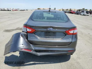2016 Ford Fusion SE Hybrid with VIN 3FA6P0LU9GR166408, listed as a Copart auction lot 59931995 with 104,560 mi miles and Salvage title. Bid and sale history available at DreamBid. Image 6.