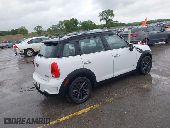 2013 MINI Countryman S ALL4 with VIN WMWZC5C50DWP30199, listed as a IAAI auction lot 42399104 with 103,367 mi miles and . Bid and sale history available at DreamBid. Image 4.