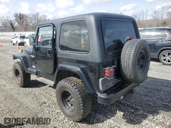 1997 Jeep Wrangler Sahara with VIN 1J4FY49S2VP495910, listed as a Copart auction lot 47794585 with 147,420 mi miles and Salvage Title. Bid and sale history available at carsss.com. Image 2.