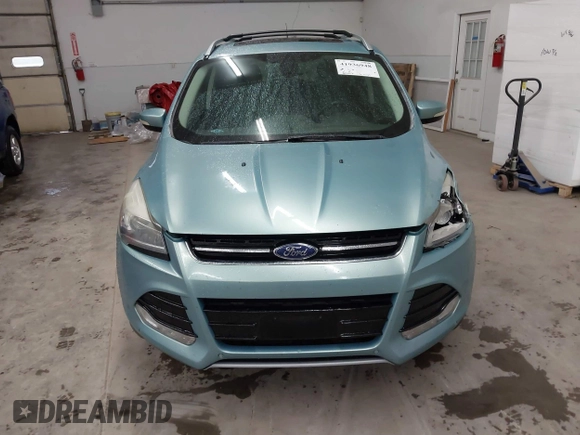 2013 Ford Escape Titanium with VIN 1FMCU9J9XDUC60029, listed as a IAAI auction lot 41936948 with 184,012 mi miles and . Bid and sale history available at DreamBid. Image 12.