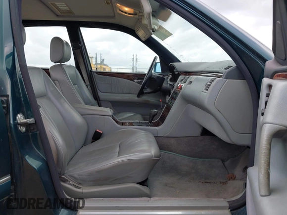 1996 Mercedes-Benz E-Class with VIN WDBJF55F7TJ022572, listed as a IAAI auction lot 41936649 with 187,706 mi miles. Bid and sale history available at carsss.com. Image 5.