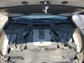 2016 Infiniti QX70 z VIN JN8CS1MWXGM752128, wystawiony jako Copart lot #52147115 z przebiegiem 122 637 mil mil oraz Tytuł czysty. Historia ofert i sprzedaży dostępna na DreamBid. Obrazek 14.