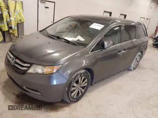 2014 Honda Odyssey EX-L with VIN 5FNRL5H67EB056983, listed as a IAAI auction lot 42318699 with 256,267 mi miles and . Bid and sale history available at DreamBid. Image 2.