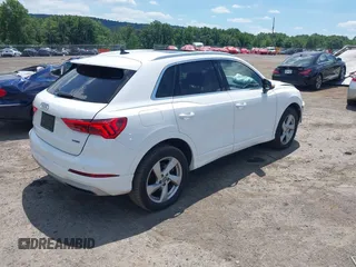 2020 Audi Q3 Premium z VIN WA1AECF39L1010852, wystawiony jako IAAI lot #39768583 z przebiegiem 100 414 mil mil oraz . Historia ofert i sprzedaży dostępna na DreamBid. Obrazek 4.