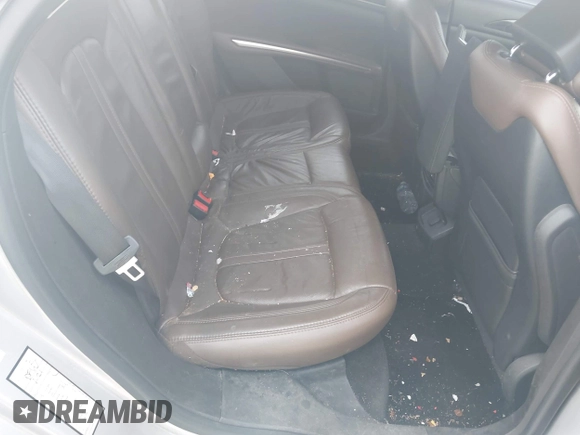2014 Lincoln MKZ with VIN 3LN6L2GK5ER823529, listed as a IAAI auction lot 42221147 with 151,751 mi miles and . Bid and sale history available at DreamBid. Image 8.