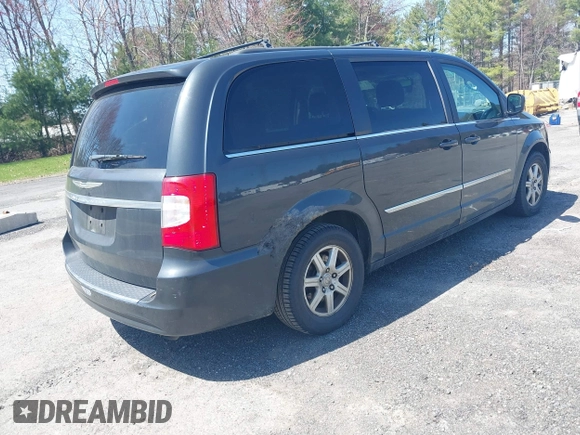 2012 Chrysler Town & Country Touring with VIN 2C4RC1BG4CR189809, listed as a IAAI auction lot 42093962 with 180,324 mi miles. Bid and sale history available at carsss.com. Image 4.