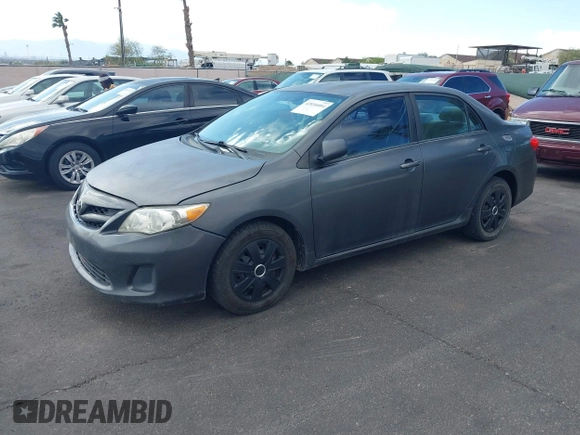 2011 Toyota Corolla L with VIN 2T1BU4EE9BC548192, listed as a IAAI auction lot 42036004 with 111,131 mi miles. Bid and sale history available at carsss.com. Image 2.