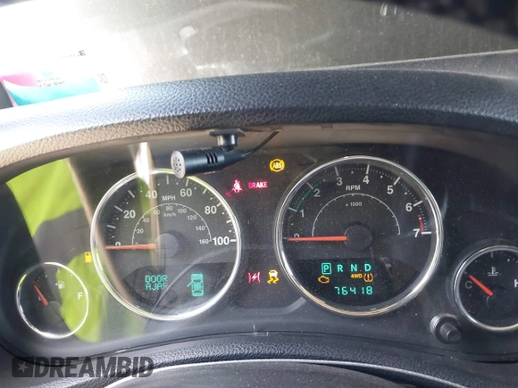 2014 Jeep Wrangler Unlimited Rubicon с VIN 1C4BJWFG2EL279938, выставлен на аукционе IAAI как лот 41920729 с пробегом 76 418 миль миль и . История ставок и продаж доступна на DreamBid. Изображение 7.