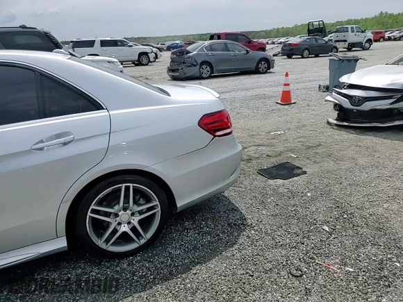 2015 Mercedes-Benz E 350 Sport with VIN WDDHF5KB3FB140317, listed as a Copart auction lot 53311025 with 55,876 mi miles and Salvage Title. Bid and sale history available at DreamBid. Image 13.