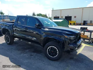 2024 Toyota Tacoma 4WD SR5 with VIN 3TYLB5JN7RT016547, listed as a IAAI auction lot 41675808 with 14,931 mi miles. Bid and sale history available at carsss.com. Image 1.
