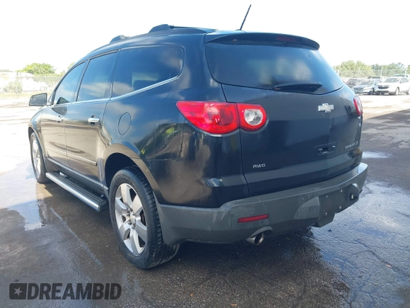 2011 Chevrolet Traverse LTZ z VIN 1GNKVLED9BJ392357, wystawiony jako IAAI lot #42155624 z przebiegiem Nie podano mil oraz . Historia ofert i sprzedaży dostępna na DreamBid. Obrazek 3.