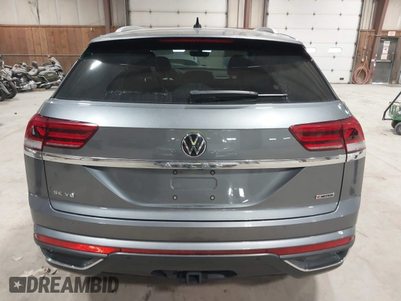 2022 Volkswagen Atlas SE z VIN 1V2KE2CA1NC206765, wystawiony jako IAAI lot #41876747 z przebiegiem 83 304 mil mil oraz . Historia ofert i sprzedaży dostępna na DreamBid. Obrazek 16.
