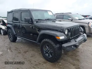 2021 Jeep Wrangler Unlimited Sport S with VIN 1C4HJXDN0MW678801, listed as a IAAI auction lot 42211815 with 96,849 mi miles and . Bid and sale history available at DreamBid. Image 1.