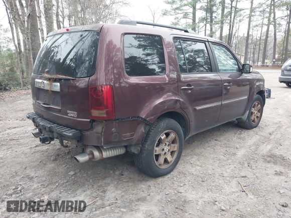 2010 Honda Pilot Touring with VIN 5FNYF4H9XAB040715, listed as a IAAI auction lot 41807334 with 262,786 mi miles and . Bid and sale history available at carsss.com. Image 4.