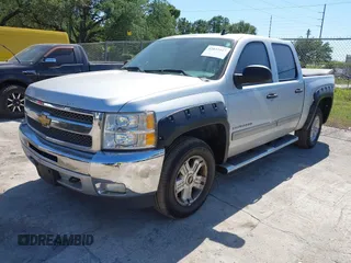 2013 Chevrolet Silverado 1500 LT with VIN 3GCPKSE71DG203443, listed as a IAAI auction lot 42033447 with 128,904 mi miles. Bid and sale history available at carsss.com. Image 17.