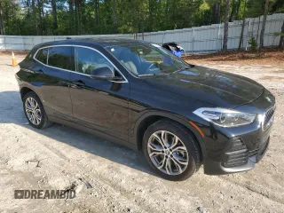 2022 BMW X2 sDrive28i z VIN WBXYH9C02N5U43355, wystawiony jako Copart lot #54235765 z przebiegiem 51 347 mil mil oraz Szkody całkowita. Historia ofert i sprzedaży dostępna na DreamBid. Obrazek 4.