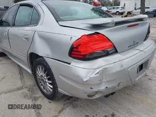 2005 Pontiac Grand Am SE with VIN 1G2NE52F75M255951, listed as a IAAI auction lot 41418328 with 199,700 mi miles. Bid and sale history available at carsss.com. Image 6.