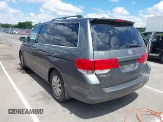 2008 Honda Odyssey EX-L z VIN 5FNRL38798B103173, wystawiony jako IAAI lot #42186360 z przebiegiem 207 341 mil mil oraz . Historia ofert i sprzedaży dostępna na DreamBid. Obrazek 3.