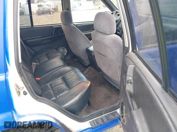 1996 Jeep Grand Cherokee Laredo with VIN 1J4GZ58YXTC329037, listed as a IAAI auction lot 42051175 with 314,571 mi miles and . Bid and sale history available at DreamBid. Image 8.