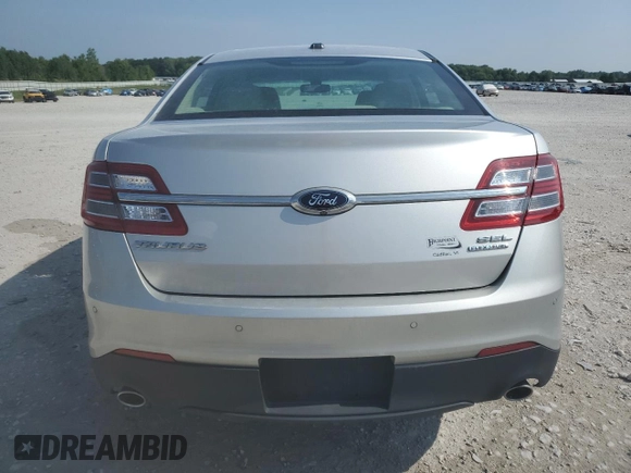 2015 Ford Taurus SEL with VIN 1FAHP2E80FG121013, listed as a Copart auction lot 59940235 with 209,632 mi miles and Clean title. Bid and sale history available at DreamBid. Image 6.
