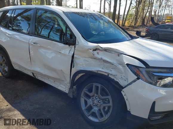 2023 Honda Passport EX-L z VIN 5FNYF8H56PB037470, wystawiony jako IAAI lot #41330084 z przebiegiem Nie podano mil oraz . Historia ofert i sprzedaży dostępna na DreamBid. Obrazek 6.