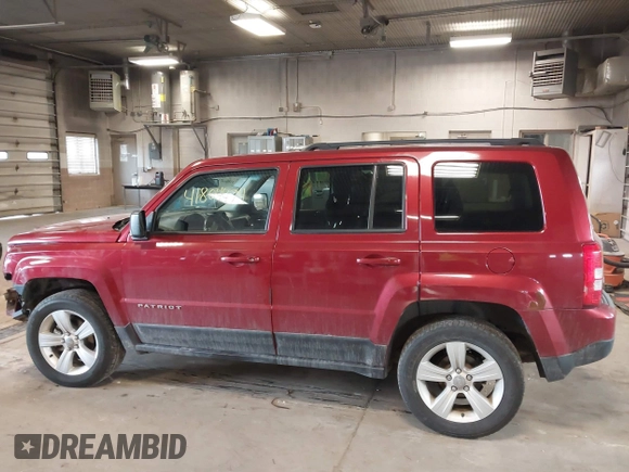 2016 Jeep Patriot High Altitude Edition with VIN 1C4NJRFB5GD685731, listed as a IAAI auction lot 41804474 with 125,184 mi miles. Bid and sale history available at carsss.com. Image 14.