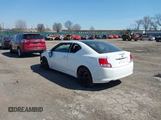 2012 Scion tC with VIN JTKJF5C7XC3029980, listed as a IAAI auction lot 41832490 with 132,140 mi miles. Bid and sale history available at carsss.com. Image 3.