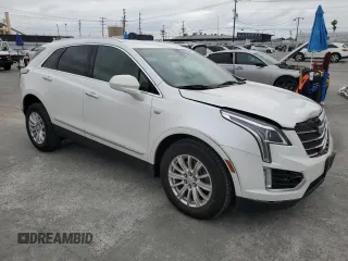 2019 Cadillac XT5 FWD with VIN 1GYKNARS5KZ215029, listed as a Copart auction lot 52828495 with 74,525 mi miles and Salvage title. Bid and sale history available at DreamBid. Image 4.